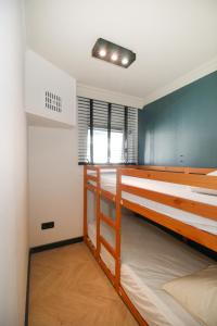 Postel nebo postele na pokoji v ubytování Vakantiepark Kijkduin - 808