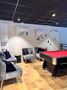 Posezení v ubytování Hôtel Restaurant Le Madame