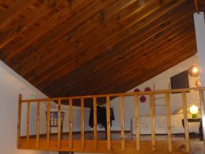 En eller flere senge i et værelse på Casa Miradouro do Pesqueiro