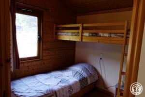 Ένα ή περισσότερα κρεβάτια σε δωμάτιο στο Chalet