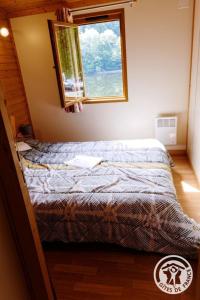 Ένα ή περισσότερα κρεβάτια σε δωμάτιο στο Chalet