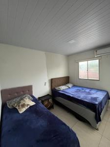 En eller flere senge i et værelse på Casa paraíso dos milagres + 21 billeder