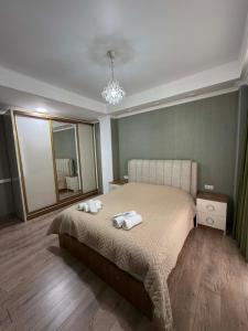 Кровать или кровати в номере Tatulis house white bridge