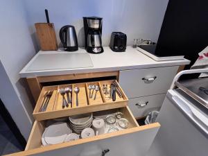 Kuchyň nebo kuchyňský kout v ubytování Charmant petit studio à 15 minutes de Montréal