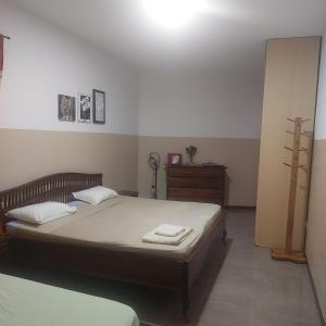 Ένα ή περισσότερα κρεβάτια σε δωμάτιο στο Oia Mindelo Chambre d'hotes