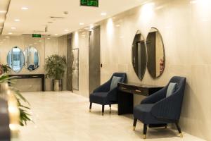 Istumisnurk majutusasutuses Penta Square Signature Studio Apartments DHA Lahore Phase 5