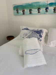 Ένα ή περισσότερα κρεβάτια σε δωμάτιο στο Almas gêmeas suíte 6