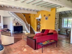 Khu vực ghế ngồi tại Cottage authentique et chaleureux entre Pau, Lourdes et les Pyrénées pour 7 personnes