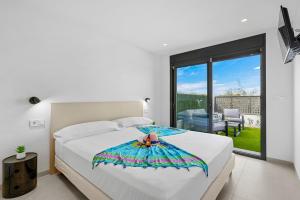 Giường trong phòng chung tại Casa del Pescadero +24 ảnh