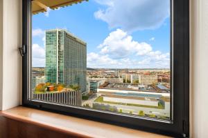 a window with a view of a city at Panorama by Verdi Hotels in Prague