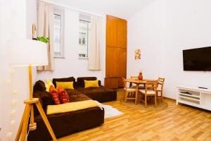 Et tv og/eller underholdning på Stadtpark Apartments by stay awesome