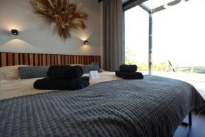 En eller flere senge i et værelse på Ateliéry nad Závozom