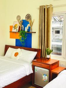 Ένα ή περισσότερα κρεβάτια σε δωμάτιο στο Bamboo Riverside Home