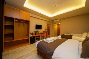 TV a/nebo společenská místnost v ubytování Sultan Han Luxery Hotel