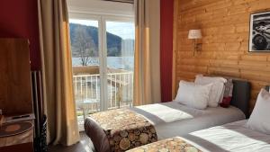 Postel nebo postele na pokoji v ubytování By La Réserve