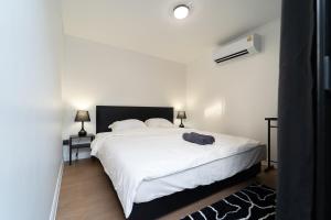 En eller flere senge i et værelse på The Lodge Bangkok Poolvilla 2 + 52 billeder