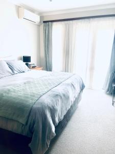 Postel nebo postele na pokoji v ubytování La Piazza