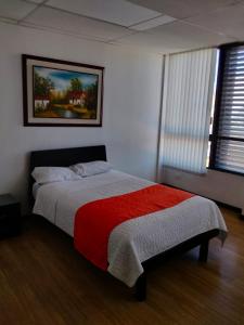 Postel nebo postele na pokoji v ubytování Hotel Bariloche Premium