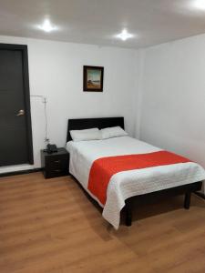 Postel nebo postele na pokoji v ubytování Hotel Bariloche Premium + 5 fotografií