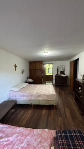 En eller flere senge i et værelse på Casa La Falda 4 hab