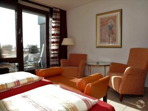 Posezení v ubytování Königsegg mit Hallenschwimmbad