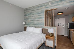 Кровать или кровати в номере TownePlace Suites Dayton Beavercreek +21 фотография