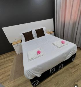 Ένα ή περισσότερα κρεβάτια σε δωμάτιο στο PPi LODGE