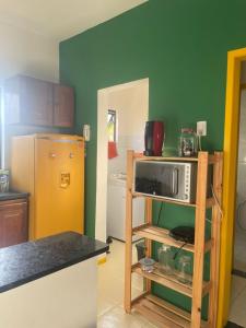 Η κουζίνα ή μικρή κουζίνα στο Aconchegante e tranquil