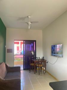 Μια τηλεόραση ή/και κέντρο ψυχαγωγίας στο Aconchegante e tranquil