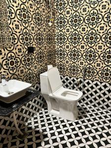 Et badeværelse på Troy Resorts and wellness