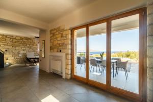 Et opholdsområde på Villa Seiri by PosarelliVillas