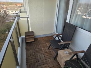 TV a/nebo společenská místnost v ubytování Ferienwohnung Nähe Flughafen + 6 fotografií