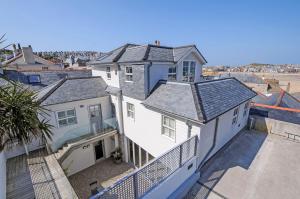 an aerial view of a white house at The Tide House in St Ives