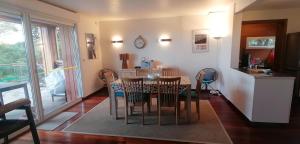 a dining room with a table and chairs at VILLA ANGELINI in Valle-di-Campoloro +33 photos