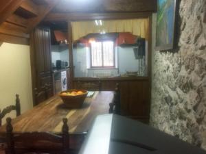 Kuchyň nebo kuchyňský kout v ubytování Casa Chole, La Portilla + 25 fotografií
