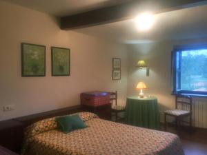 Postel nebo postele na pokoji v ubytování Casa Chole, La Portilla