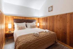 Ένα ή περισσότερα κρεβάτια σε δωμάτιο στο Quinta do Limite - Casa do Camponês +19 φωτογραφίες