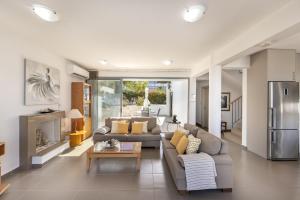 Kuchyň nebo kuchyňský kout v ubytování Lenias Sea View