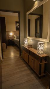 Ένα ή περισσότερα κρεβάτια σε δωμάτιο στο Apart Ejecutivo Centrico a 10m de la Catedral Tango 08