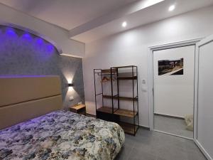 a bedroom with a large bed and a shelf at B&b Ai Vecchi Mulini in Gragnano