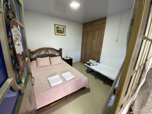 Ένα ή περισσότερα κρεβάτια σε δωμάτιο στο Finca Agua Luna