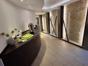 a kitchen with a counter with a coffee maker on it at Hotel Phönix in Bad Füssing