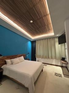 Un pat sau paturi într-o cameră la Casa Pepe