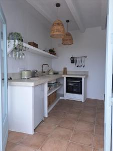 Køkken eller tekøkken på Casa Luna Miel