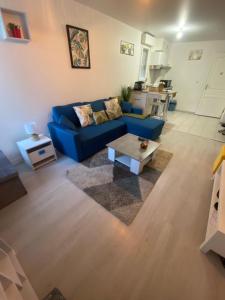 Χώρος καθιστικού στο Superbe Appartement Proche Paris