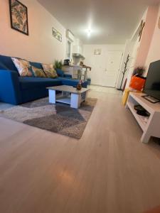 Χώρος καθιστικού στο Superbe Appartement Proche Paris