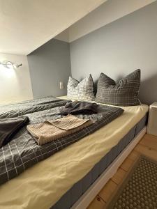 Ένα ή περισσότερα κρεβάτια σε δωμάτιο στο Strandoase