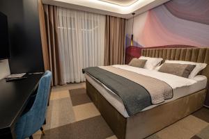 Postel nebo postele na pokoji v ubytování Hotel Story