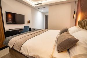 Postel nebo postele na pokoji v ubytování Hotel Story