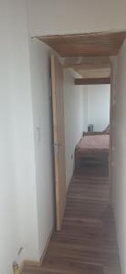 En eller flere senge i et værelse på HabitacionTemporal1